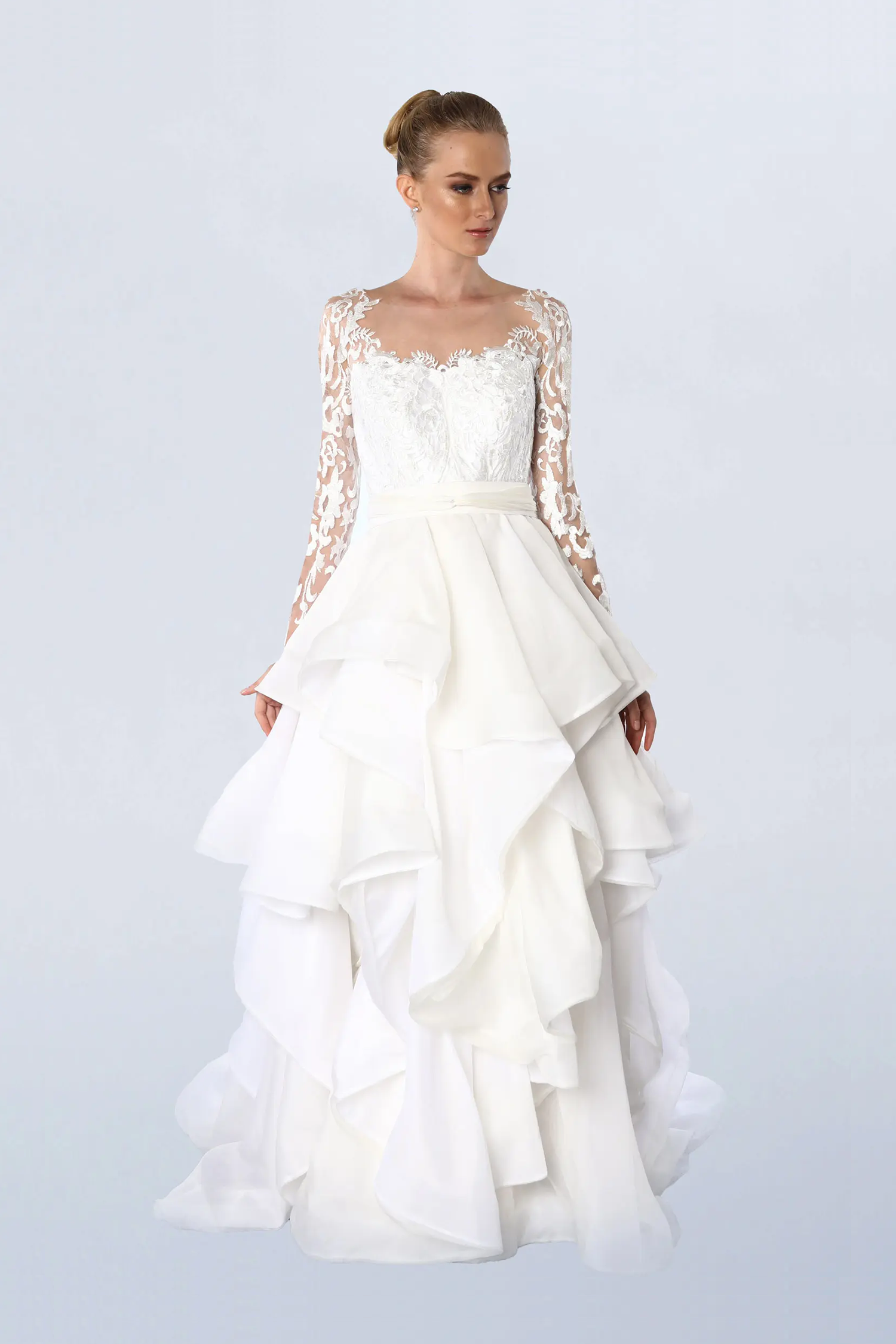 Off white lace gown and overskirt