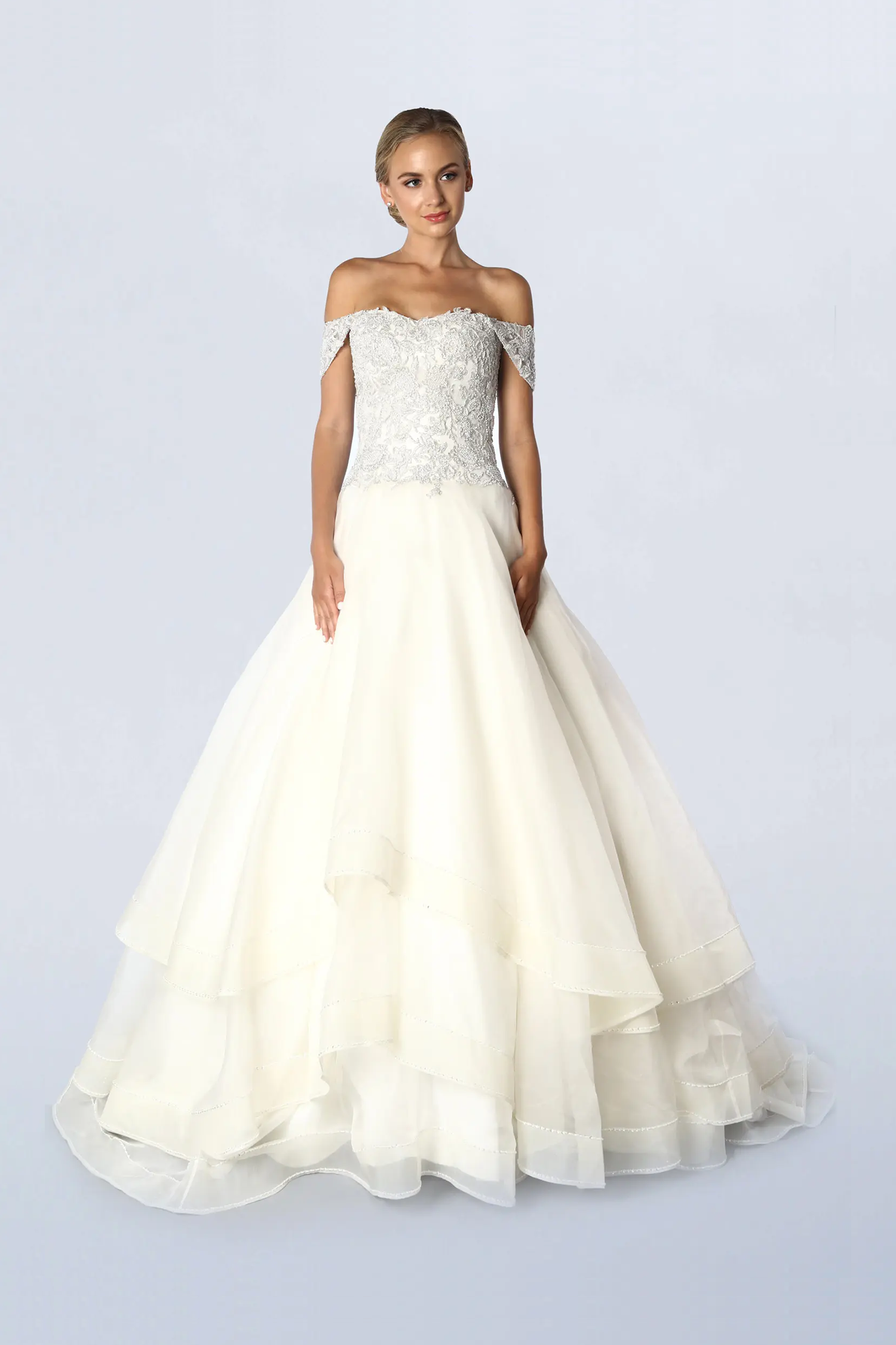Off-the-shoulder ivory ball gown