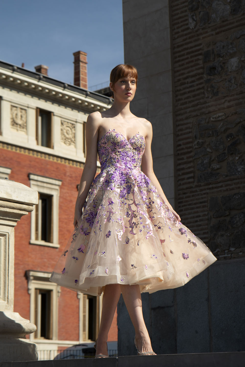 Woman in a beige with purple floral applique dress. 20, image 1