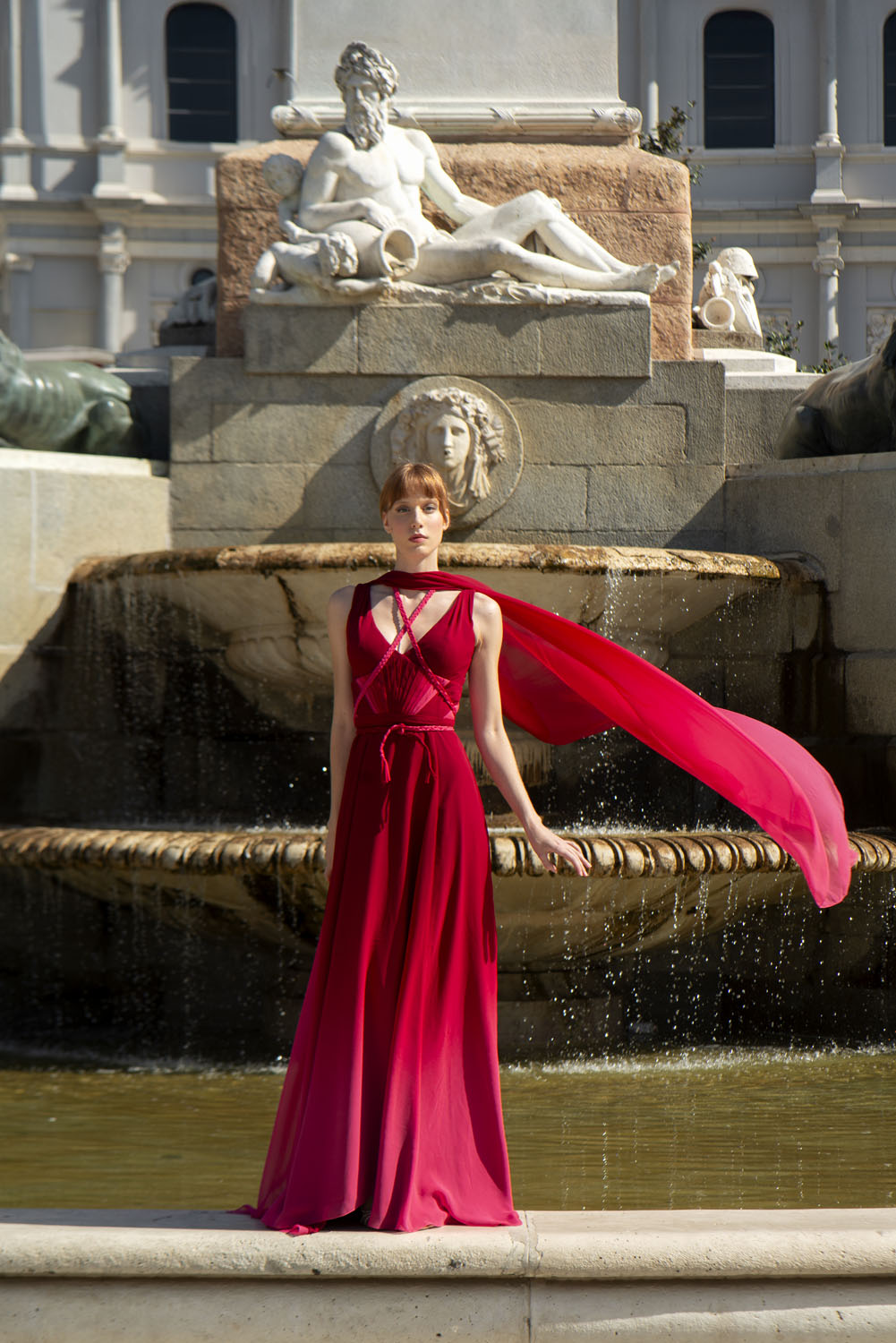 Woman in a red gown. 24, image 1