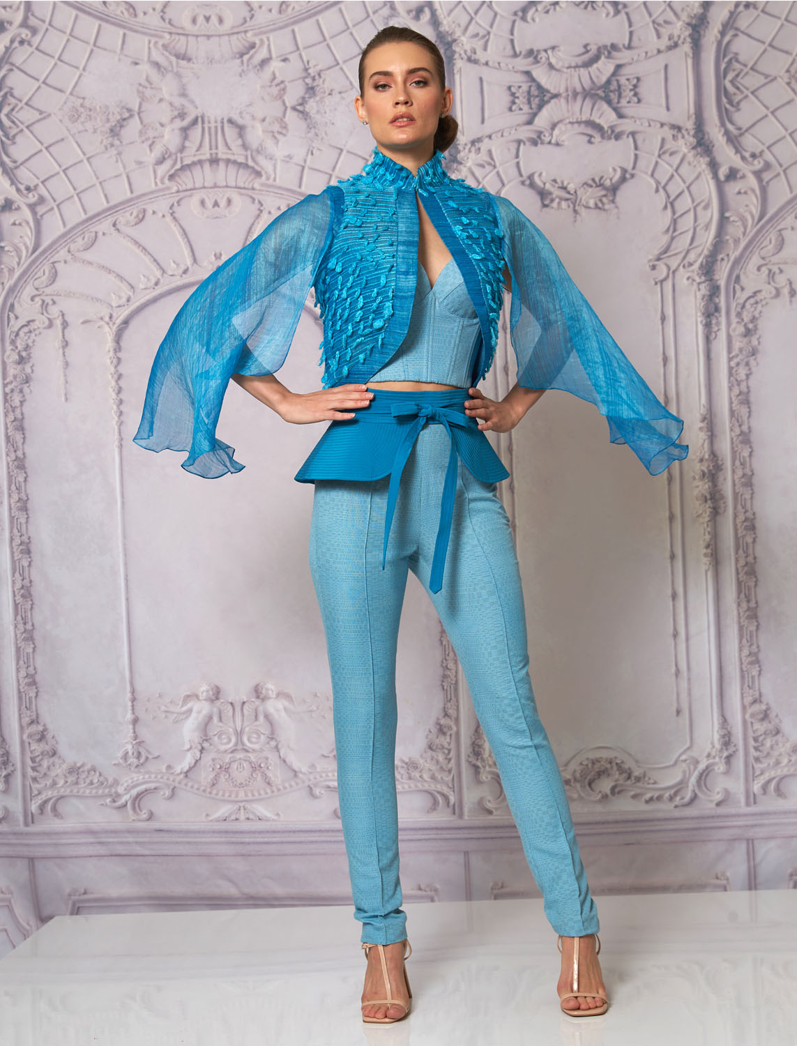 Front view of a woman in a turquoise corset, pants, bolero and belt 12, image 1