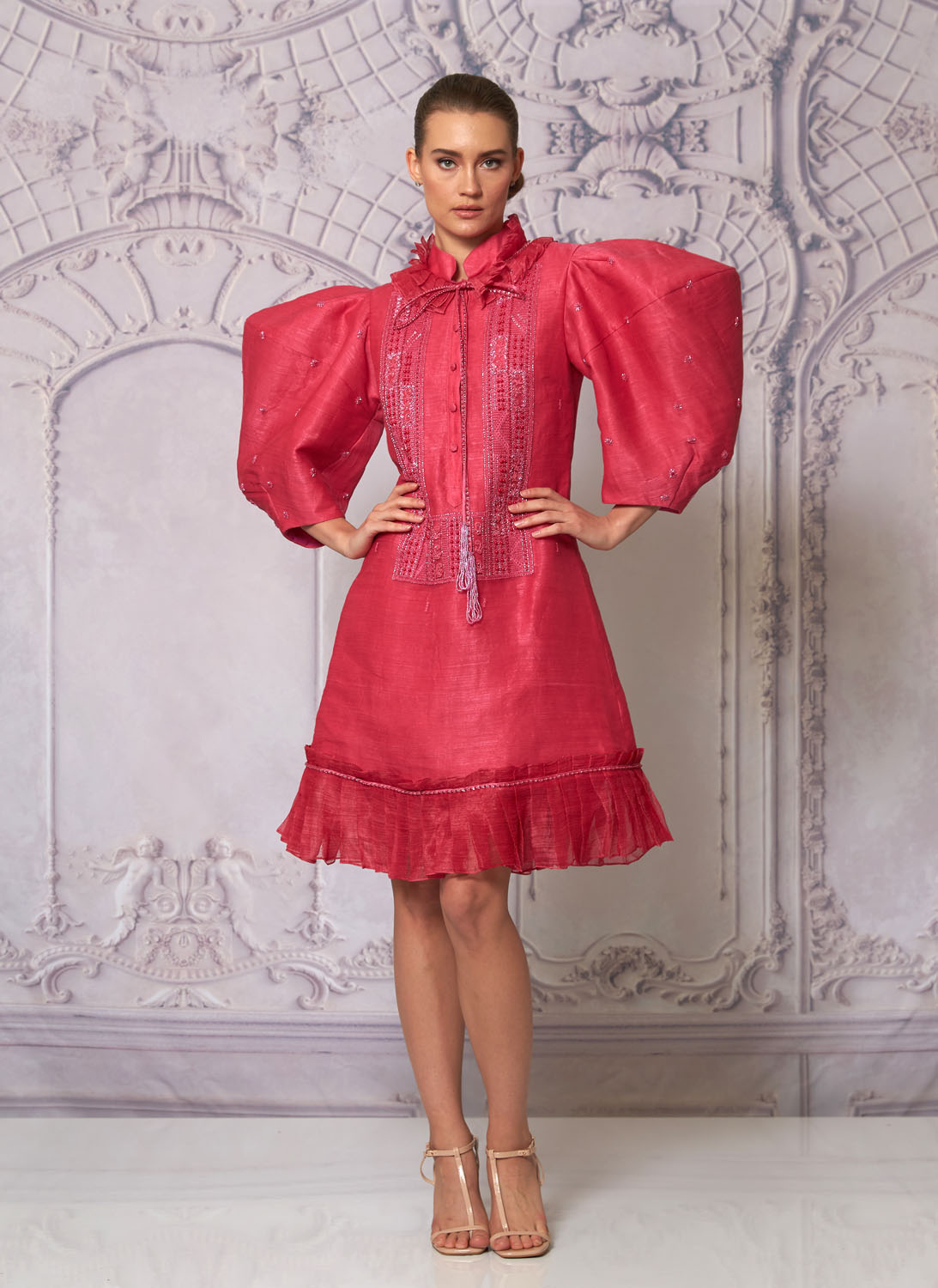 Front view of a woman in a fuchsia dress with puff sleeves 15, image 1