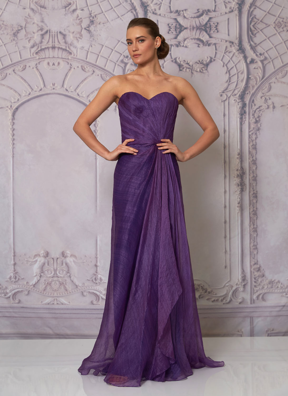 Front view of a woman in a strapless purple gown 2, image 1