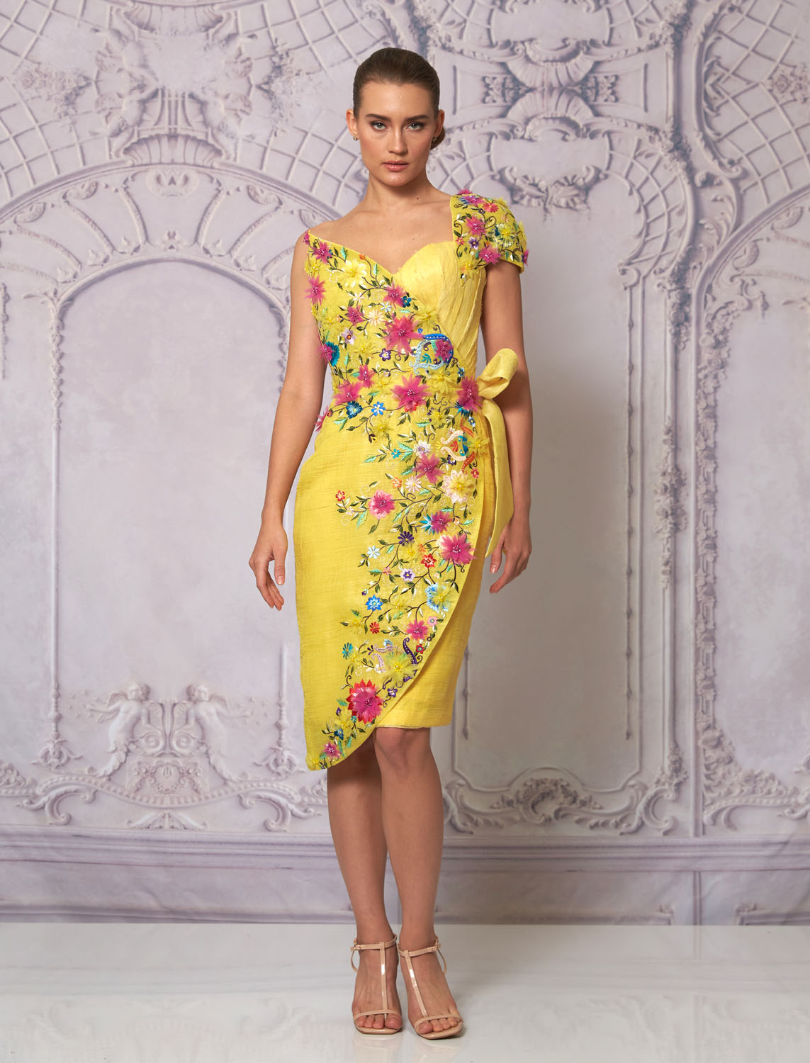 Front view of a woman in a yellow floral dress 5, image 1