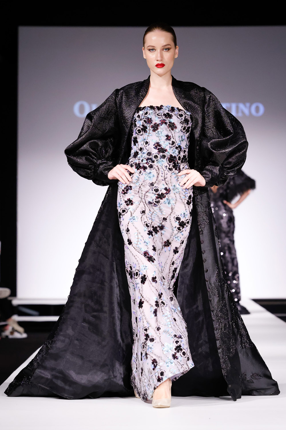 Beaded lace mermaid gown and black brocade opera jacket
