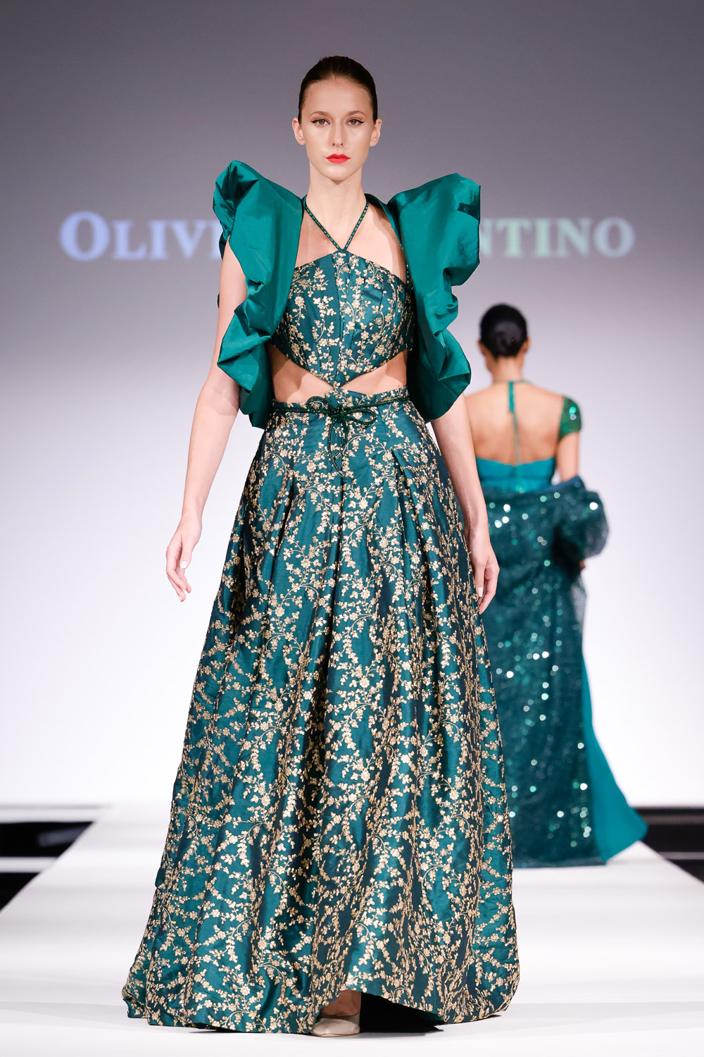 Green and gold embroidered ball gown, and green shrug
