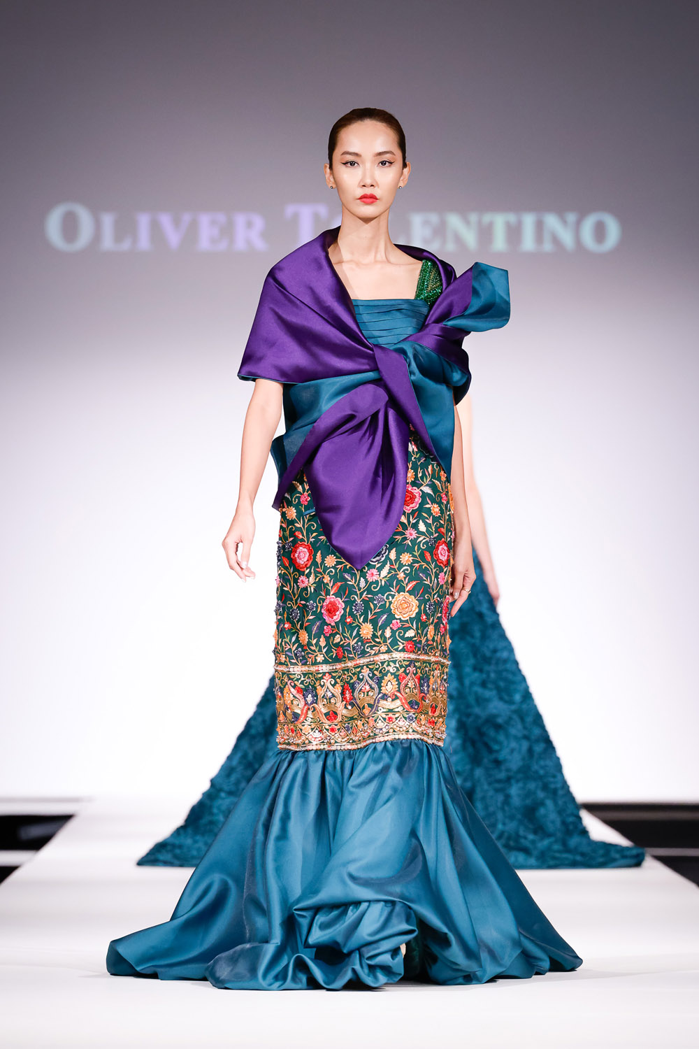 Green and multi-colored embroidered gown, and purple and green wrap