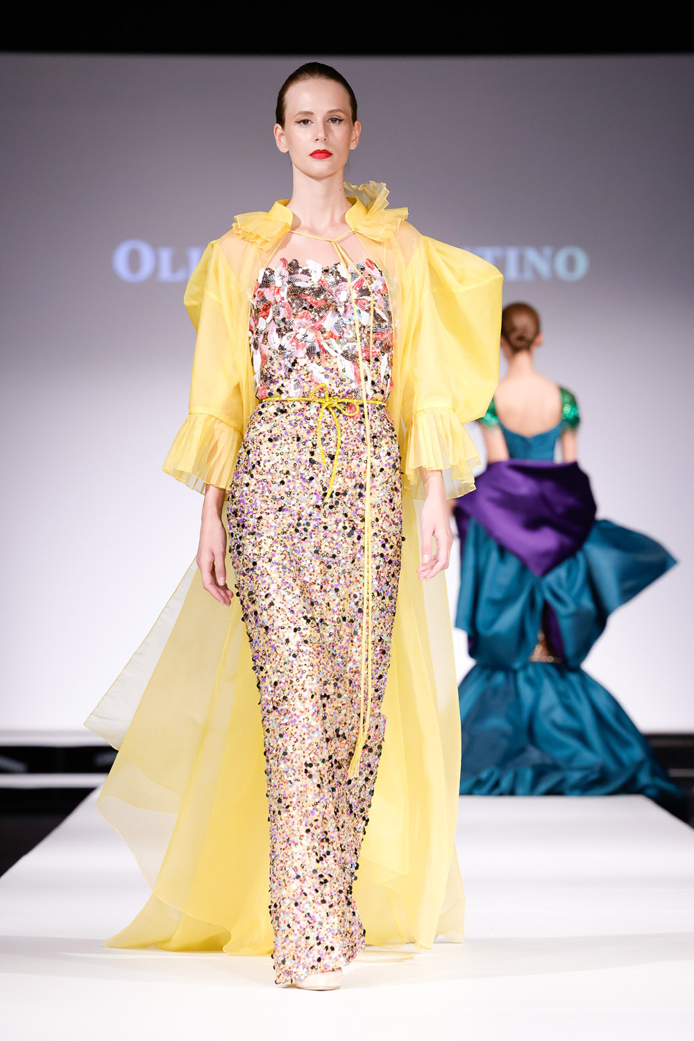 Multi-colored sequin column gown, and yellow opera jacket