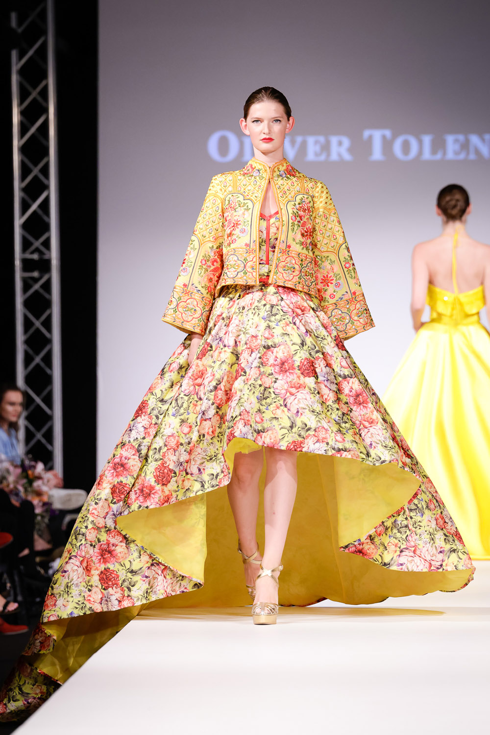 Yellow floral printed high-low gown, and yelow embroidered bolero jacket