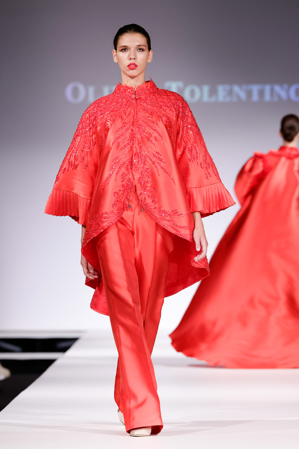 Red beaded jacket, and red pants