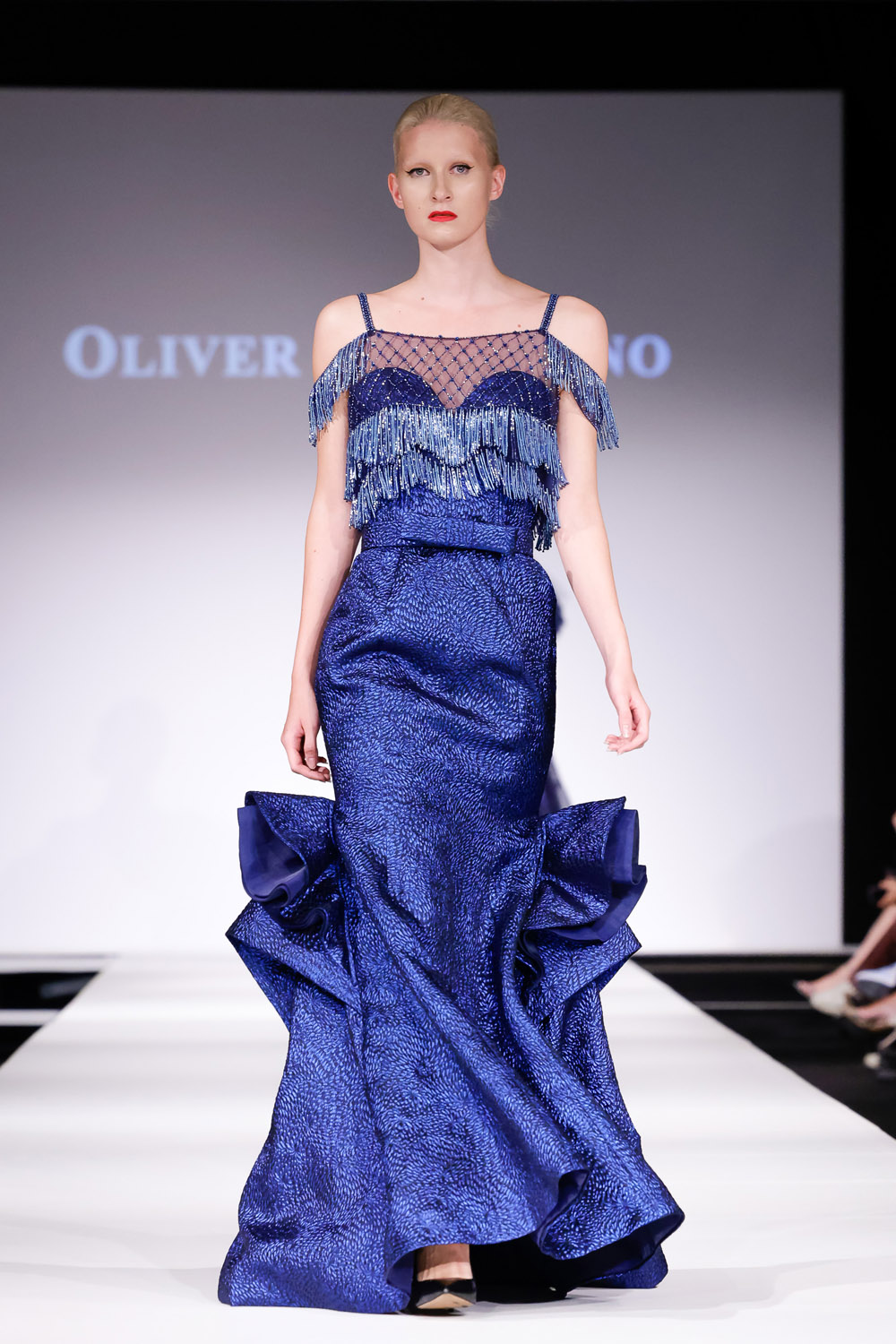 Blue brocade mermaid gown with fringe blouse