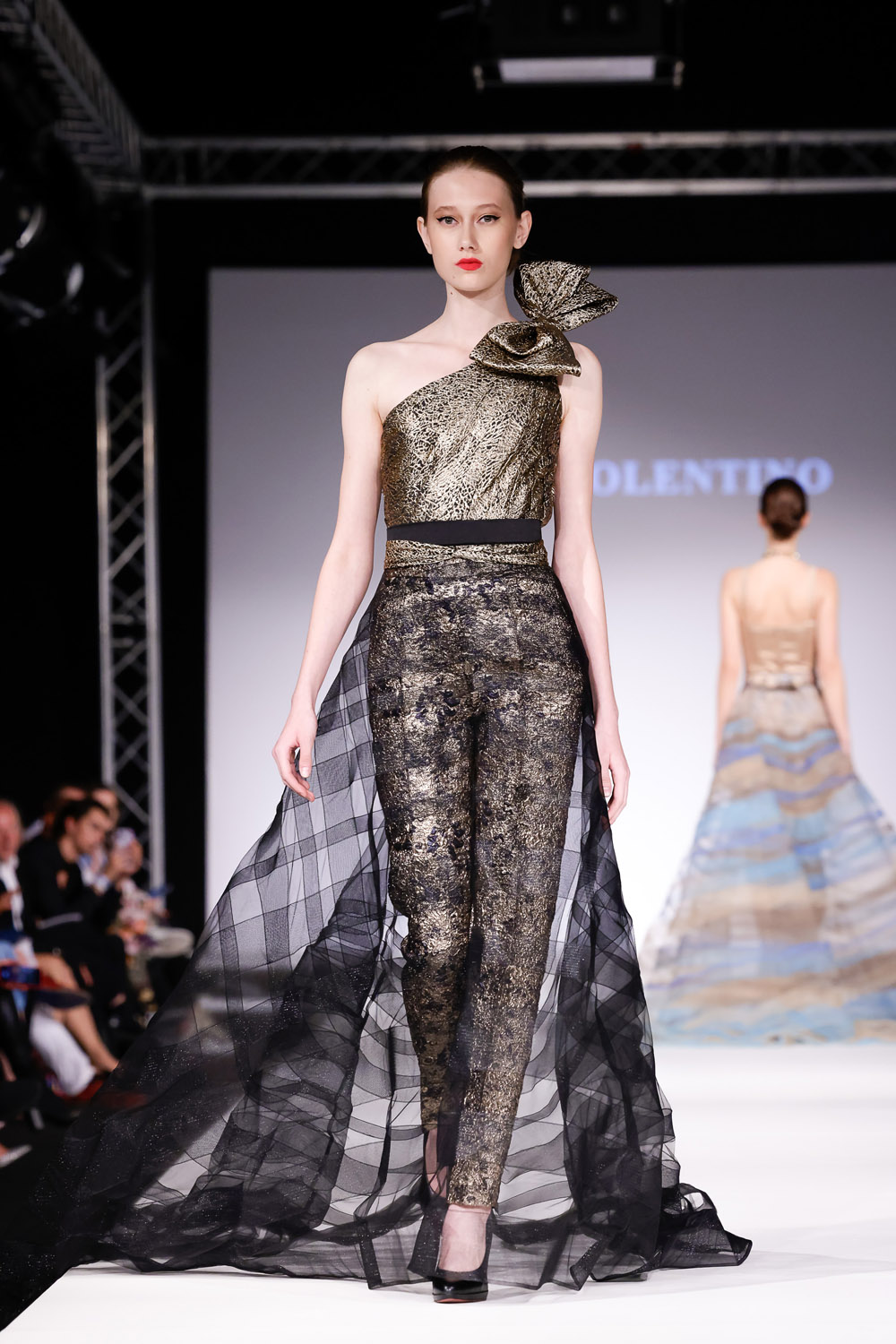 Gold brocade top, brocade pants, and black tulle overskirt