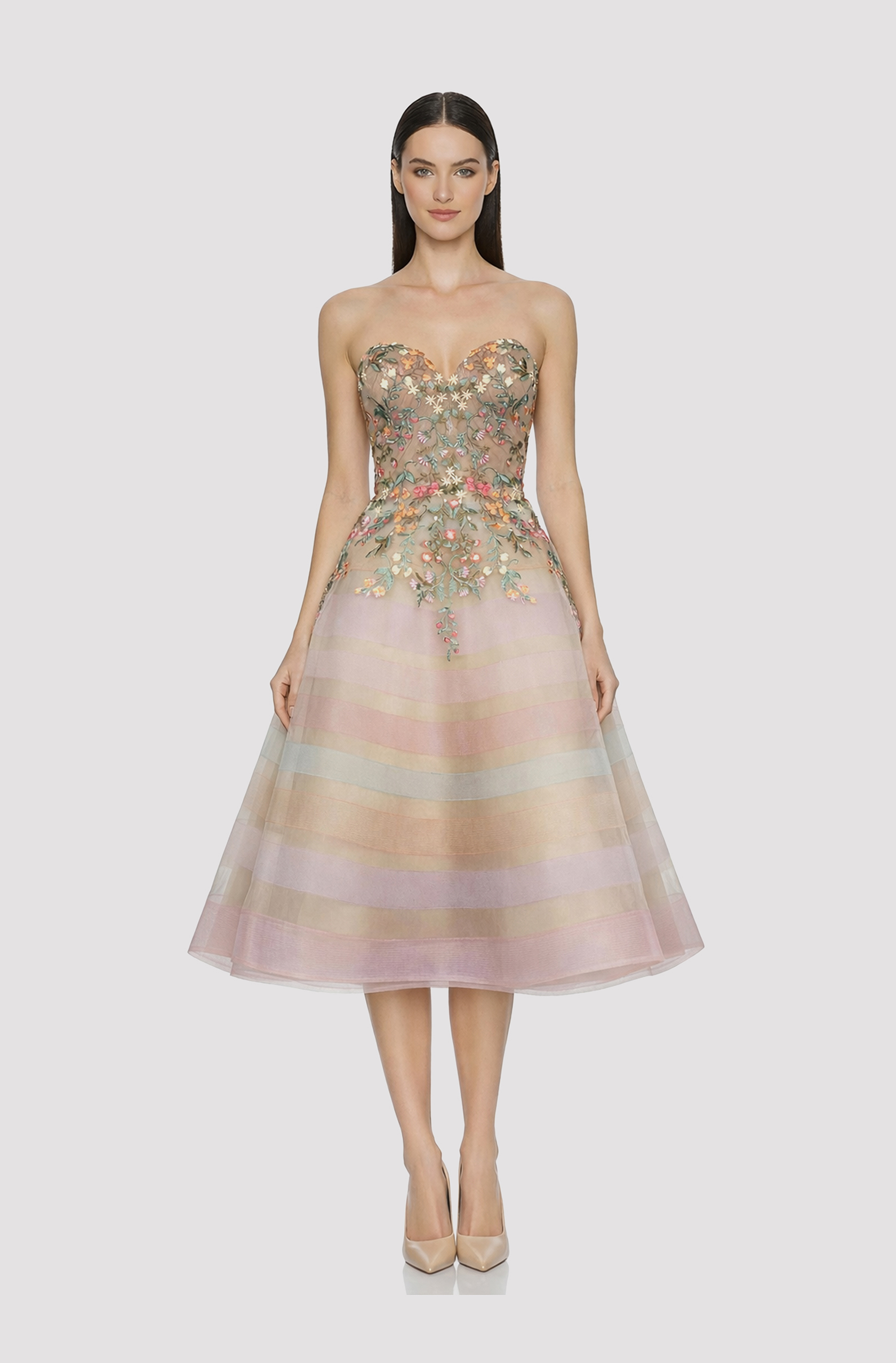 Front view of a woman in a Champagne tulle corset pastel floral appliqué and a layered pastel colored horsehair ball skirt 12, image 1
