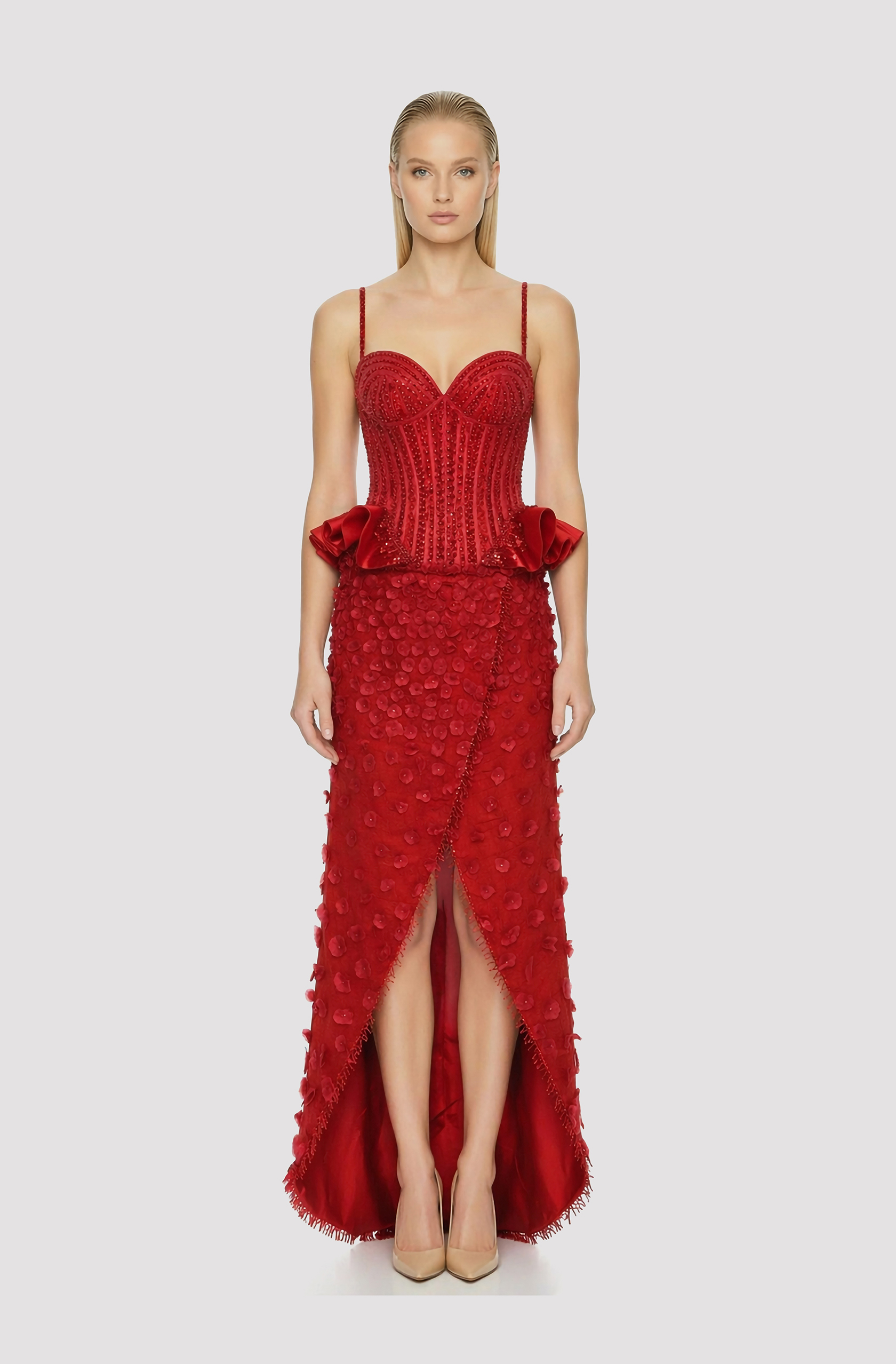 Front view of a woman in a Red ECO hand-beaded piña corset and tulip skirt embellished with pina cut-outs 19, image 1