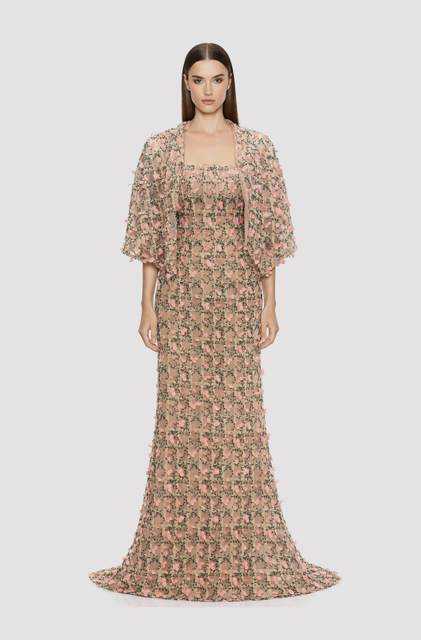 Front view of a woman in a Champagne tulle mermaid gown with pink & green lace with capelet 11, image 1