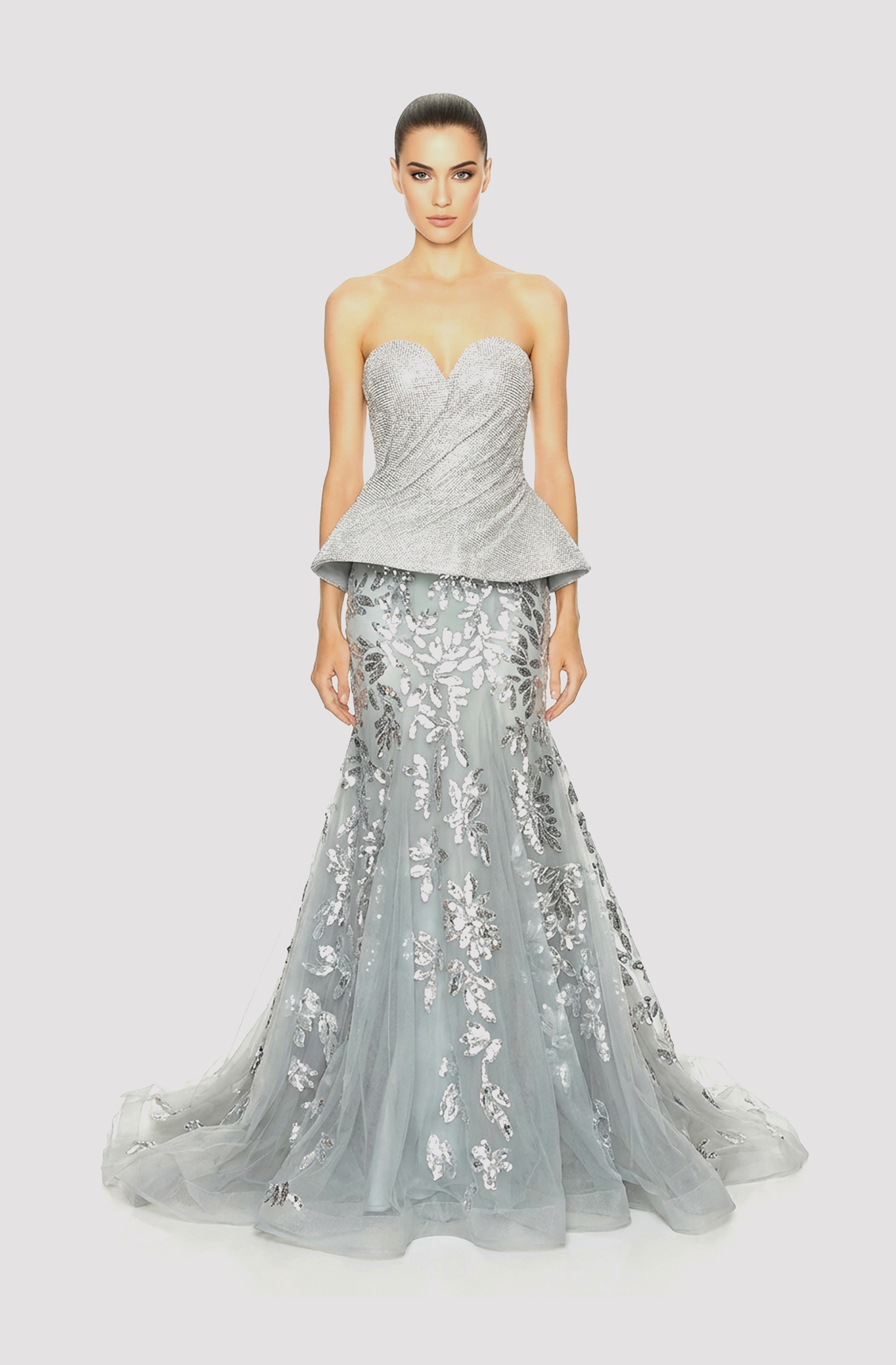 Front view of a woman in aTwo-piece silver ensemble with rhinestone chainmail structured top and a mermaid tulle skirt with silver floral sequin appliqué 39, image 1