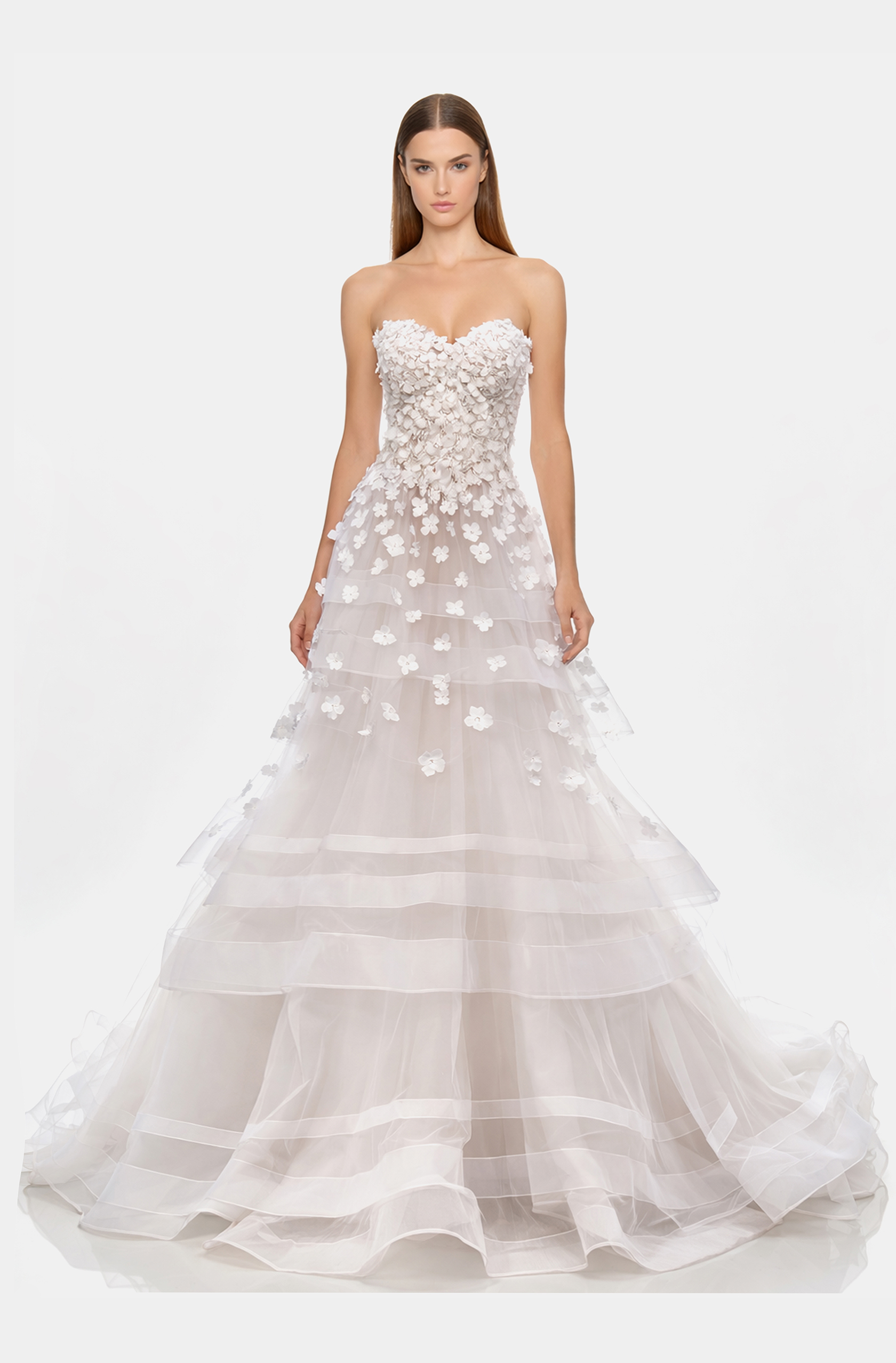 Front view of a woman in an Off-white tulle, layered horsehair ball gown with hand-sewn 3D floral embellishments 43, image 1