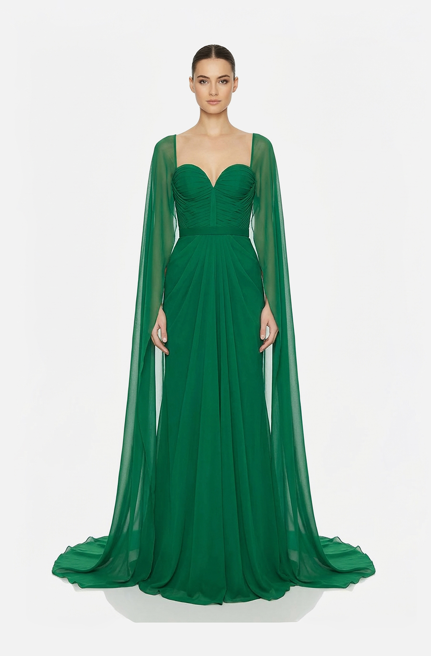Front view of a woman in an Emerald green silk chiffon draped gown and sheer attached cape sleeves 5, image 1