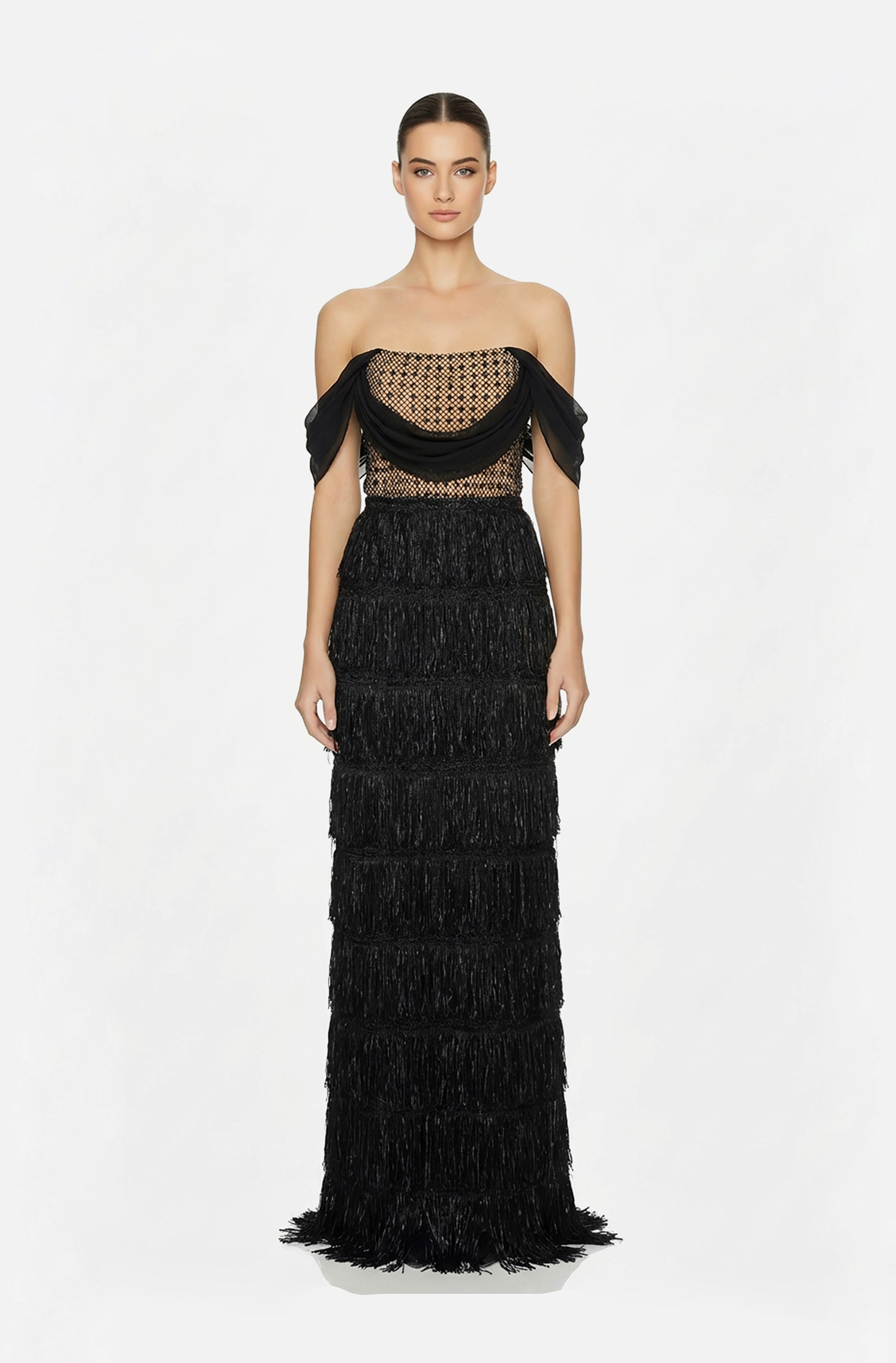 Front view of a woman in a Black off-shoulder column gown with mesh & rhinestone top and skirt with fringes 50, image 1