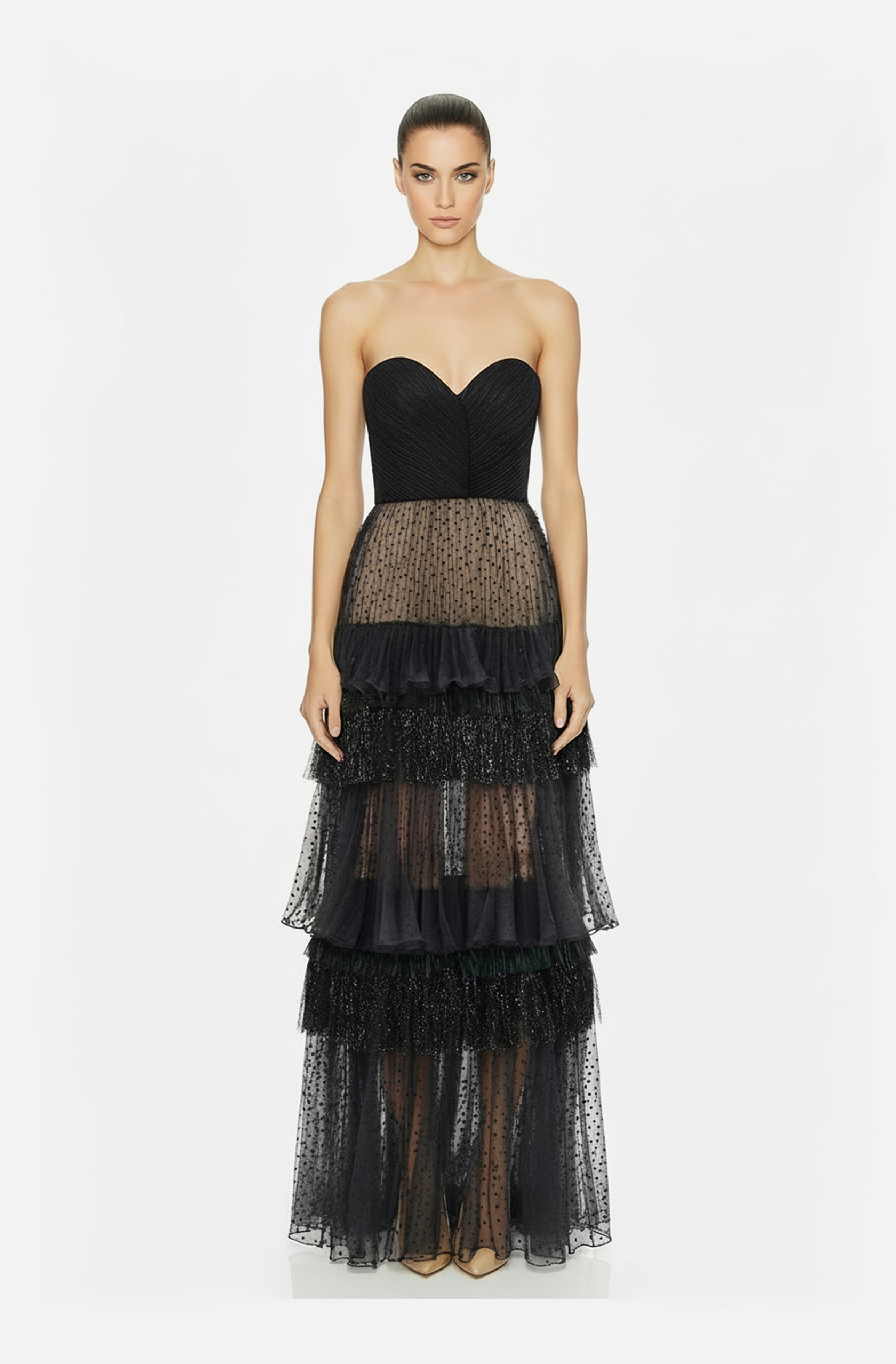 Front view of a woman in a Black strapless corseted gown with hand-draped bodice & dotted sheer organza tiered skirt accented w/ metallic fringe 52, image 1